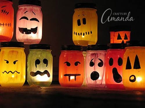 Full tutorial on how to make these AWESOME Halloween luminaries! I LOVE all the colors and faces! From Amanda Formaro at Crafts by Amanda
