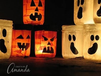 Full tutorial on how to make these AWESOME Halloween luminaries! I LOVE all the colors and faces! From Amanda Formaro at Crafts by Amanda