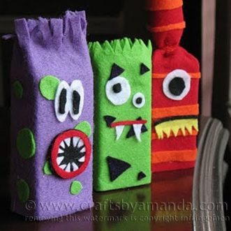 Make adorable monsters from recycled juice boxes and felt! Great for Halloween too! By Amanda Formaro of Crafts by Amanda