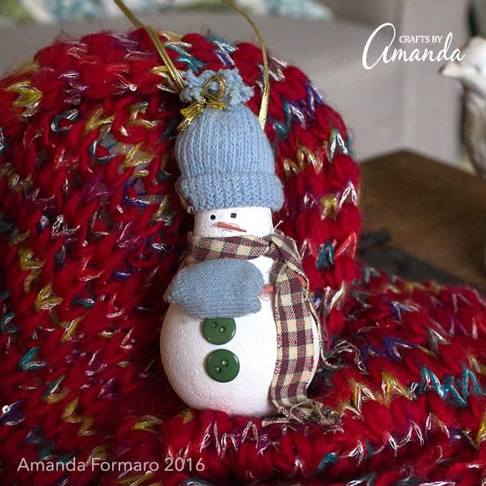 Turn an old burnt out light bulb into an adorable light bulb snowman ornament to hang on your tree year after year after year! Great homemade gift idea!