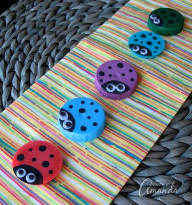 Plastic Lid Ladybugs: a cute kid's craft made from recycled milk lids!