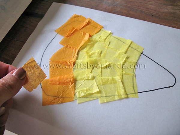 adding orange tissue paper