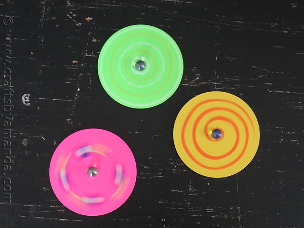 Make Recycled CD Spinners from CraftsbyAmanda.com @amandaformaro