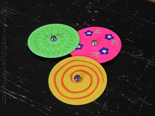 Make Recycled CD Spinners from CraftsbyAmanda.com @amandaformaro