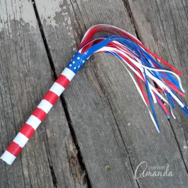 You can't go to a Memorial Day or Fourth of July parade without something to wave in the air, so we're going to make this duct tape parade stick with the kids. 
