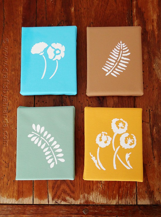 Stenciled Botanicals on Canvas in blue, brown, green, and orange