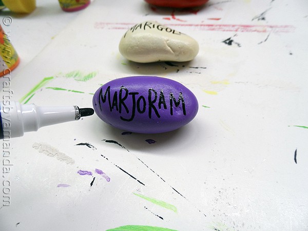 Rock Garden Markers: paint rocks to make markers for your plants