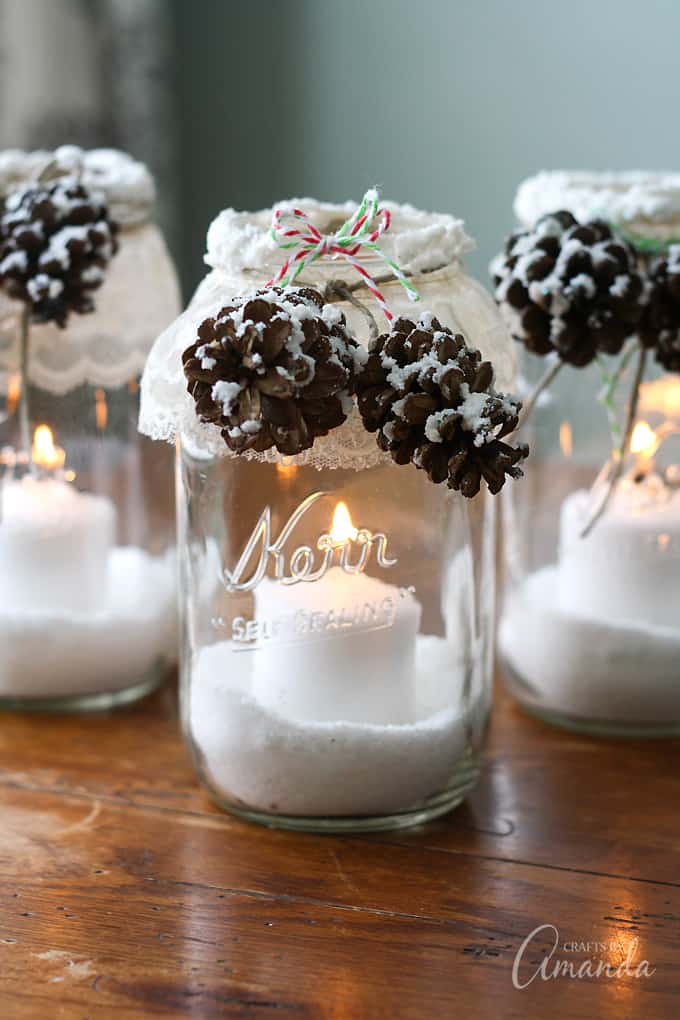 snowy pinecone candle jars