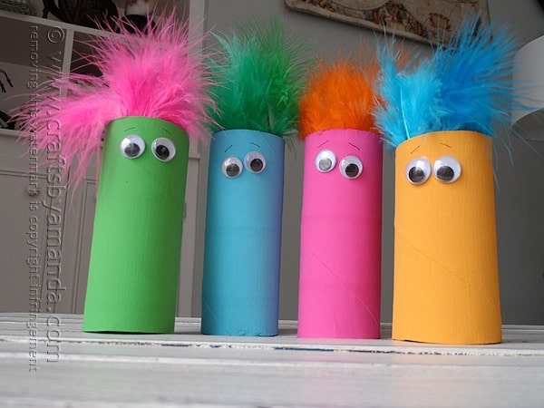 What a simple craft for the kids! Adding these cardboard tube featherheads to the list! #kidscrafts @amandaformaro