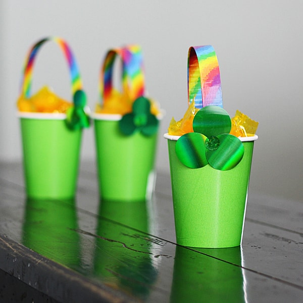green cups with rainbow duct tape handles and a shamrock on front