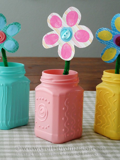 I can't wait to make these! These recycled jars will look great in the center of my table for Easter. So. Doing. it.