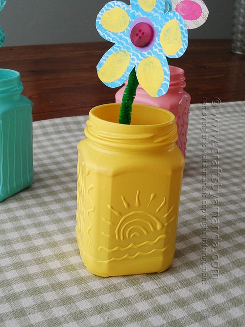 I love all these recycled spring jars, but the sun design is my favorite. oh the possibilities!