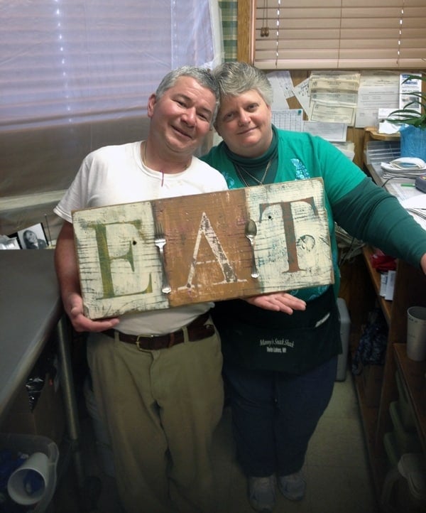 Manny and April of Manny's Snack Shack in Twin Lakes, WI with EAT Sign by Amanda Formaro @amandaformaro of Crafts by Amanda