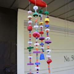 Make a wind chime from recycled plastic lids! Full step by step tutorial with printable instructions from Crafts by Amanda!