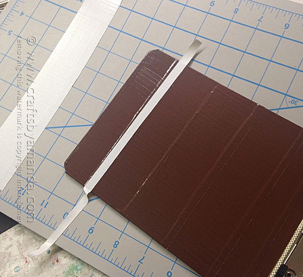 Add strips of white duct tape to the clipboard