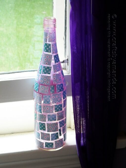 Pretty! Uses enamel paints, Mod Podge and scrapbook paper. - Mosaic Wine Bottle craft from Amanda Formaro of Crafts by Amanda