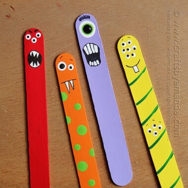 Make adorable craft stick monsters from jumbo craft sticks and paint! Perfect for back to school bookmarks or just a fun monster craft or Halloween craft! From Amanda Formaro of Crafts by Amanda