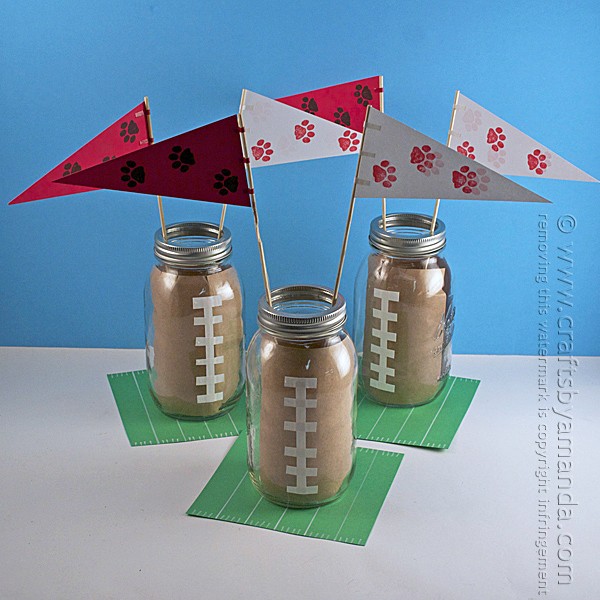 football centerpieces made from mason jars and construction paper