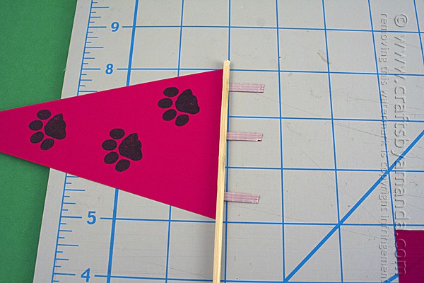 add a paw print stamp to the paper