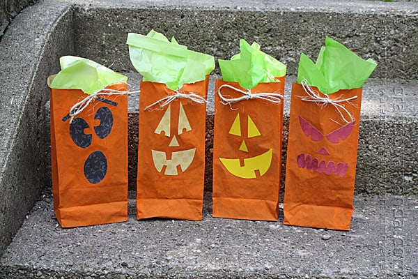 Jack O Lantern Treat Bags fill with goodies for a Halloween party