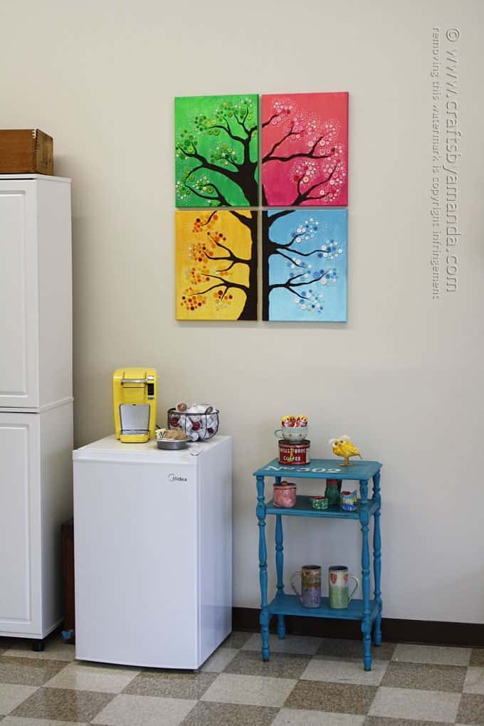 This button tree wall art is made from four canvases, paint and colorful buttons. Get step by step instructions so you can make button tree wall art too! - by Amanda Formaro, Crafts by Amanda