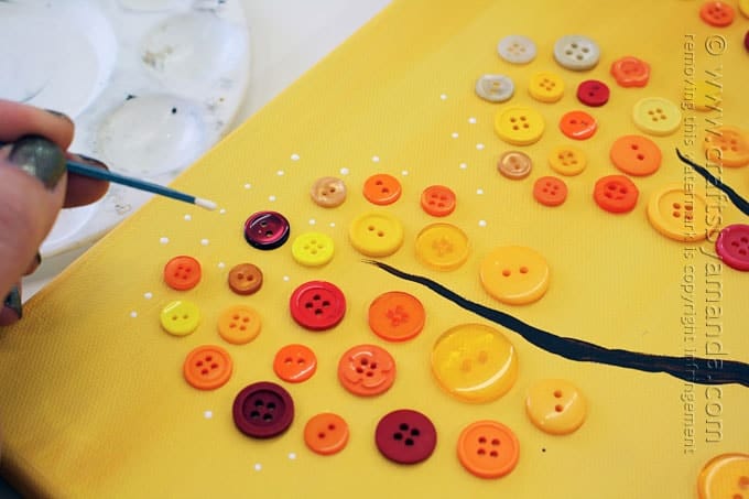adding dots around the buttons with paint