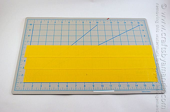 yellow tape on cutting mat