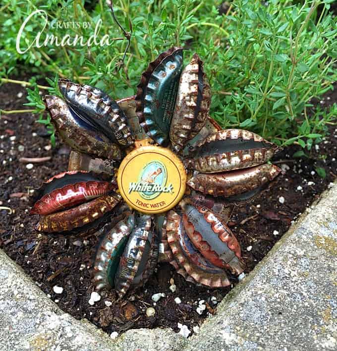 Bottle Cap Flower turn old bottle caps into a fun garden craft