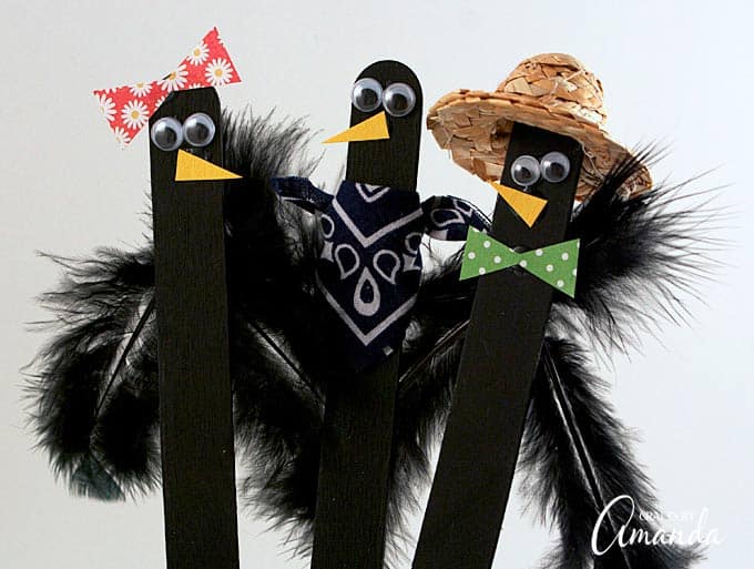 These popsicle stick crows are perfect to use as puppets, or to tuck into plants as part of your fall decor!