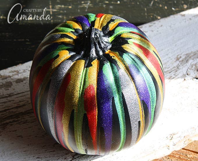 Add an easy, colorful touch to your Halloween decor with this glitter drip pumpkin!