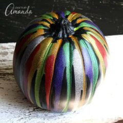 Add an easy, colorful touch to your Halloween decor with this glitter drip pumpkin!