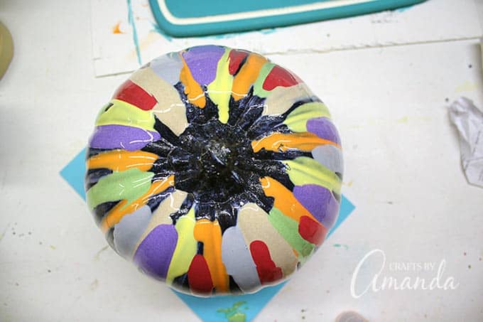 Add an easy, colorful touch to your Halloween decor with this glitter drip pumpkin!