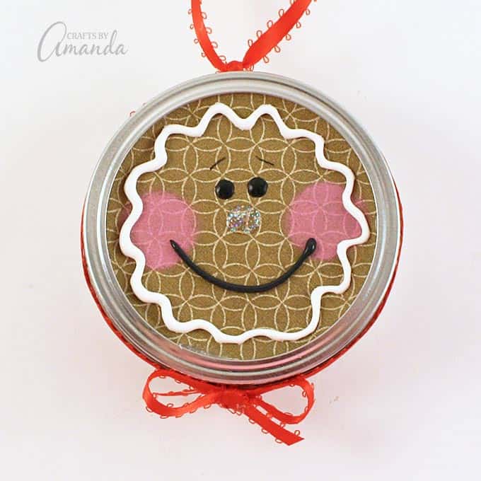 Turn a canning jar lid into a sweet gingerbread man with this canning lid ornament project!