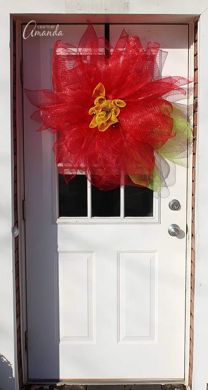 Learn how to make this beautiful deco mesh poinsettia flower