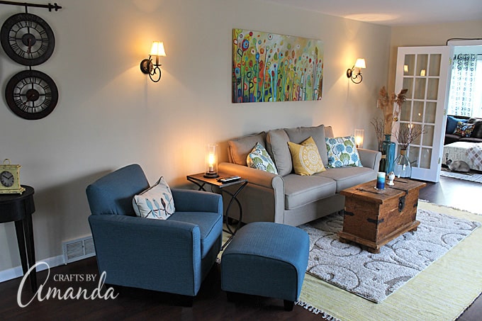 See this gorgeous living room makeover from Crafts by Amanda. A bright cheery living room with lots of windows!