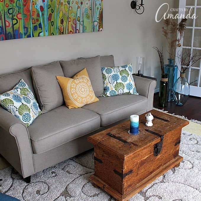 See this gorgeous living room makeover from Crafts by Amanda. A bright cheery living room with lots of windows!