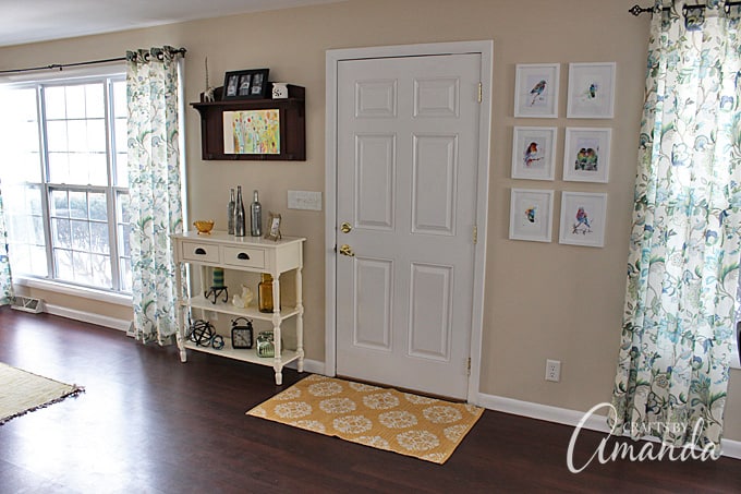 See this gorgeous living room makeover from Crafts by Amanda. A bright cheery living room with lots of windows!