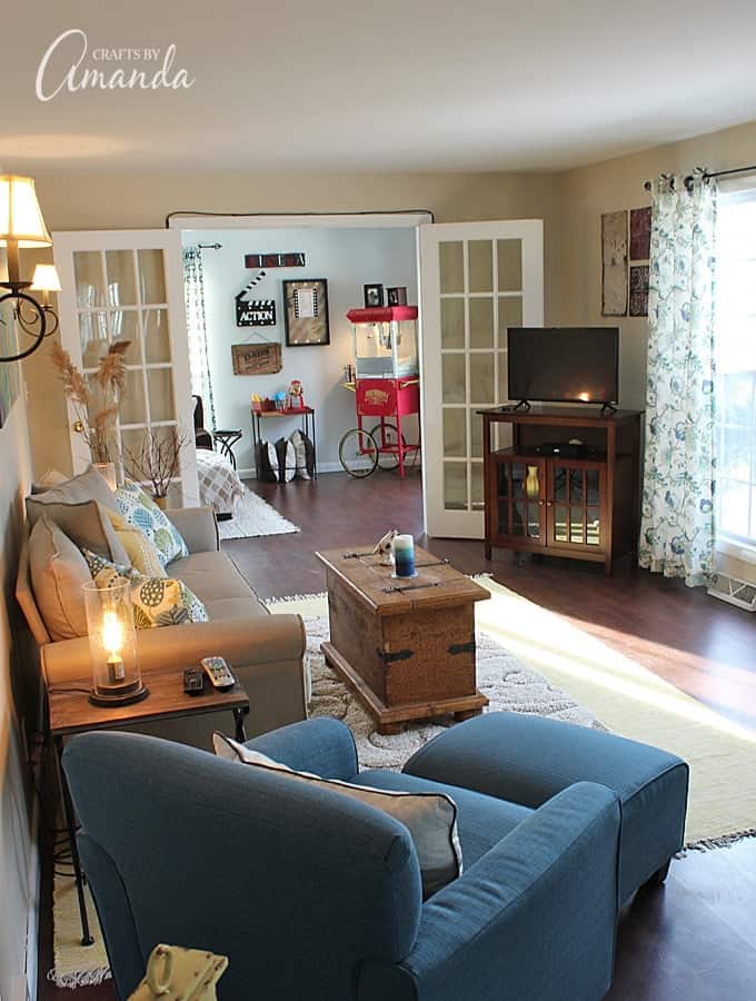 See this gorgeous living room makeover from Crafts by Amanda. A bright cheery living room with lots of windows!