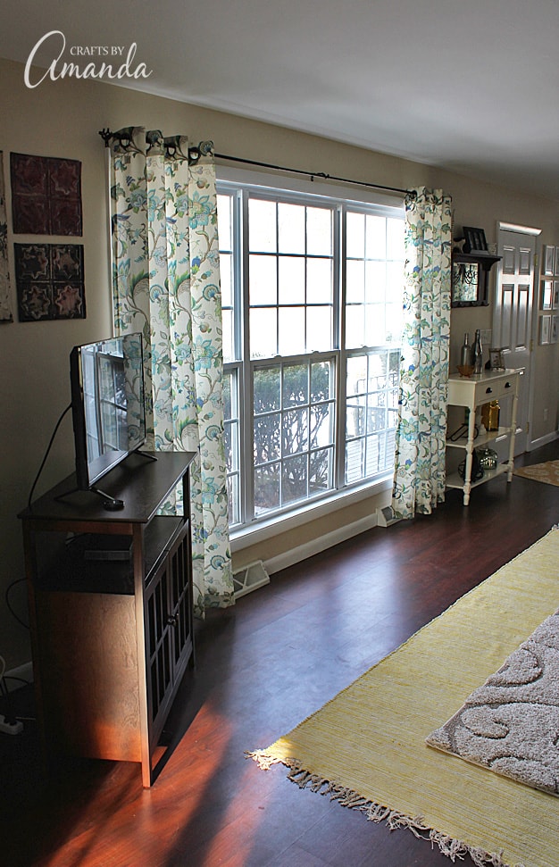 See this gorgeous living room makeover from Crafts by Amanda. A bright cheery living room with lots of windows!