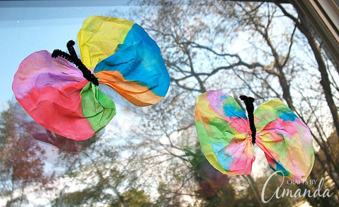 butterflies on window made from coffee filters