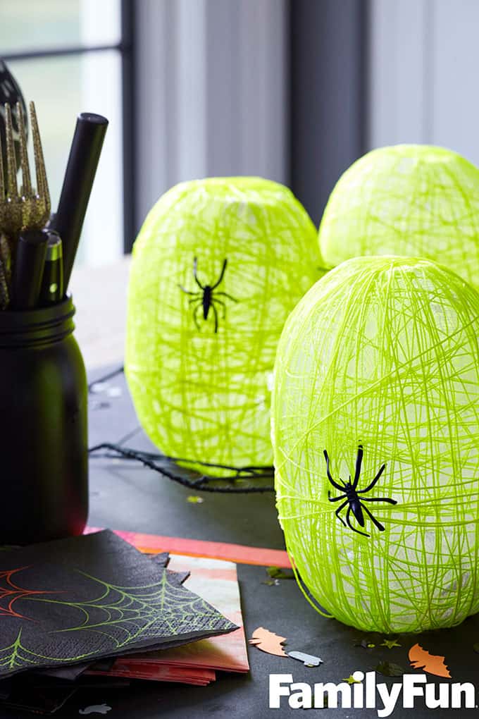 These spider nest lanterns are super cute and a fun Halloween craft for kids. Display them at your Halloween party, they will be a big hit!