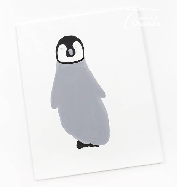 Fill in the penguin chick's body and beak with grey paint