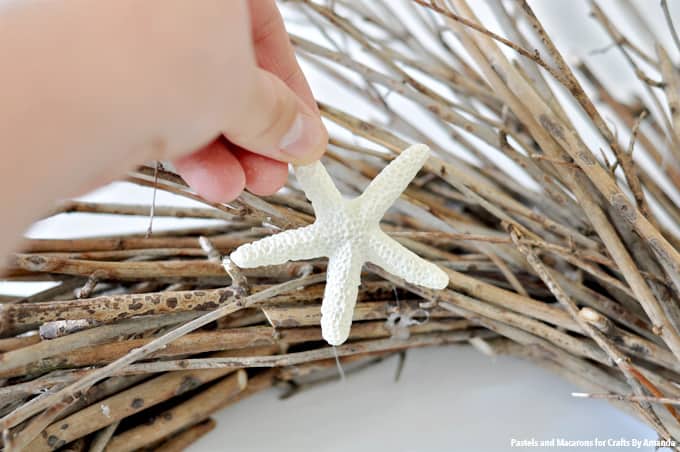 adding starfish to the wreath