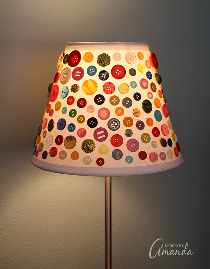 Lampshade with buttons on it