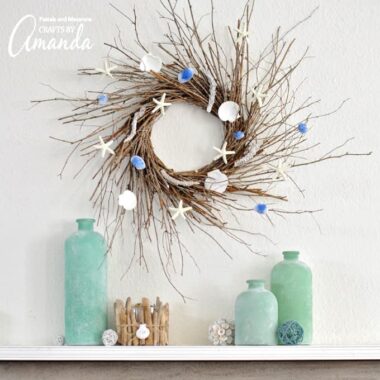 This DIY Coastal Wreath is made from the twigs and seashells you'll find on the beach this summer.