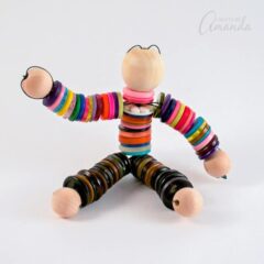 You're done making your button doll! Now pose him however you want.