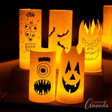 By day they are colorful shelf or window decorations, but by night they are spooky paper Halloween luminaries! Easy to make and fun to look at!