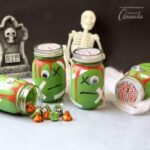 Fill these zombie mason jars with toys for a candy-free Halloween party favor. Or, just use them to decorate your house for Halloween!