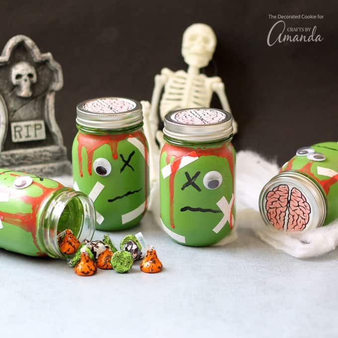 Fill these zombie mason jars with toys for a candy-free Halloween party favor. Or, just use them to decorate your house for Halloween!