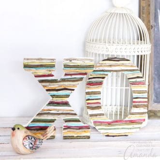 These colorful DIY painted twig wall letters are a fun and trendy way to add a personalized touch to your home or rustic wedding decor this fall.